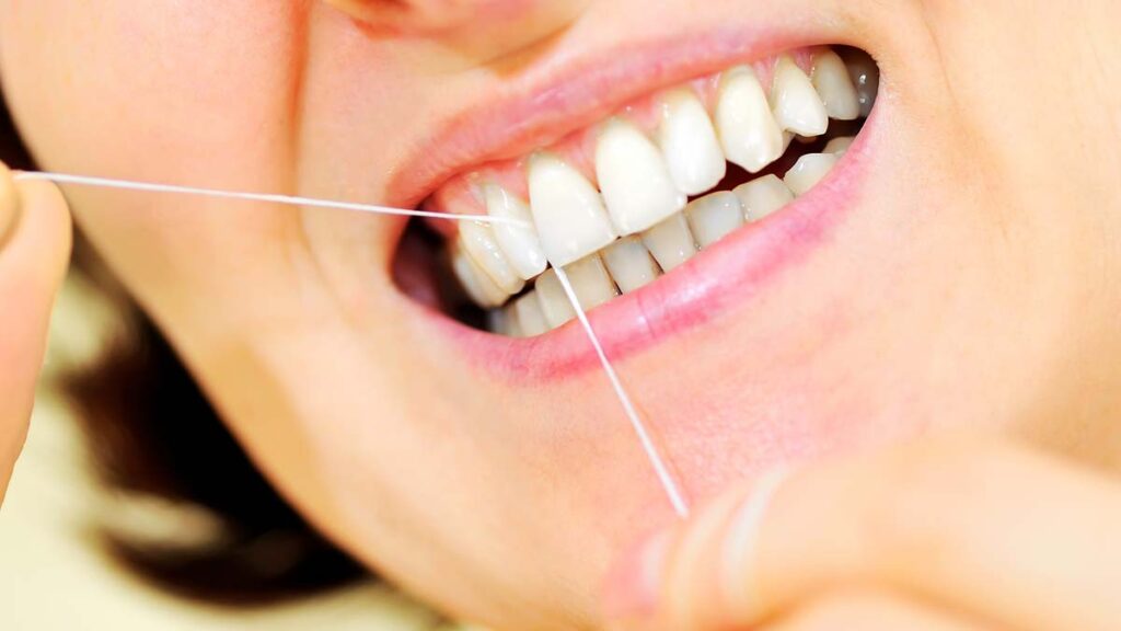 Why is Flossing Important? Universal Dentistry